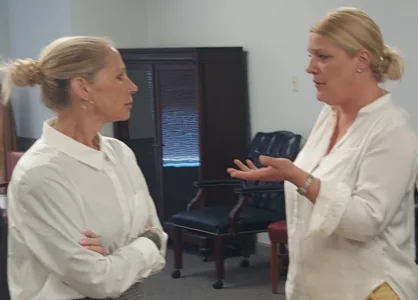 Assessor sues city over buyout dispute